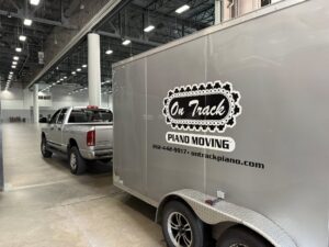 on track piano moving truck trailer 300x225